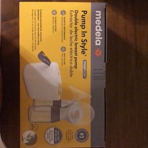 Medela in style pump. Never used